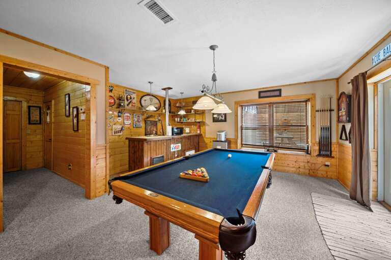 Family Room has a Pool Table, Darts and Bar
