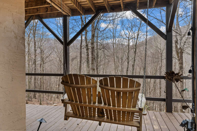 Two Person Porch Swing Overlooking Mountain Scenery