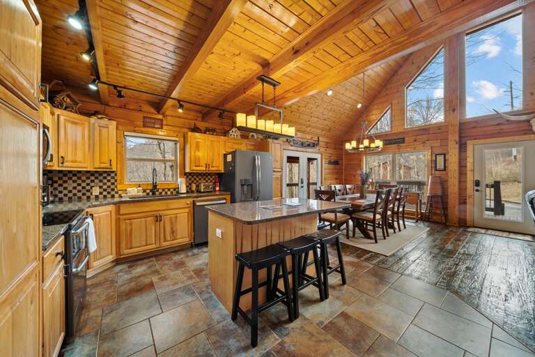 Spacious Kitchen with Granite Counters and Plenty of Dining Space