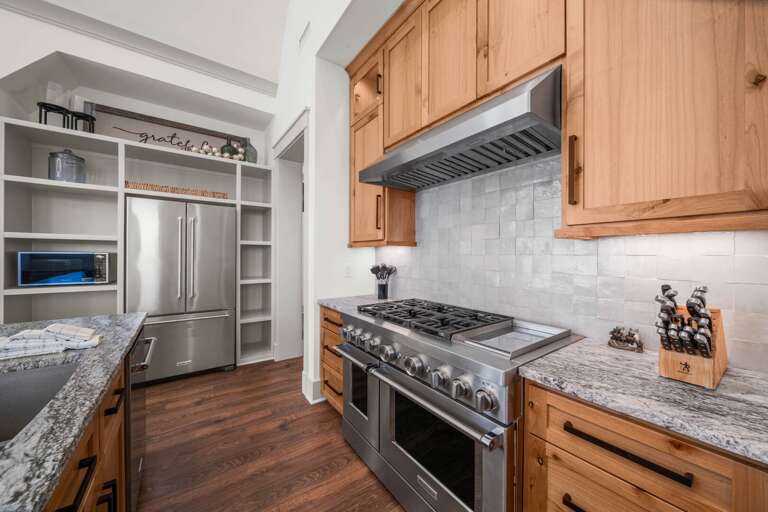 High End Stainless Appliances and Granite Counter Tops