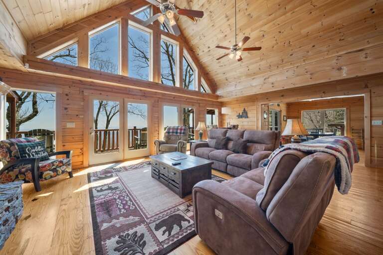 Comfortable Seating Situated Around the Fireplace and Views Comfortable Seating Situated Around the Fireplace and Views