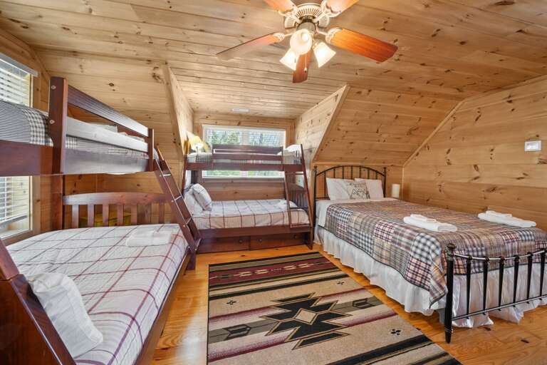 Two Twin-Over-Double Bunks and a Queen Bed Two Twin-Over-Double Bunks and a Queen Bed