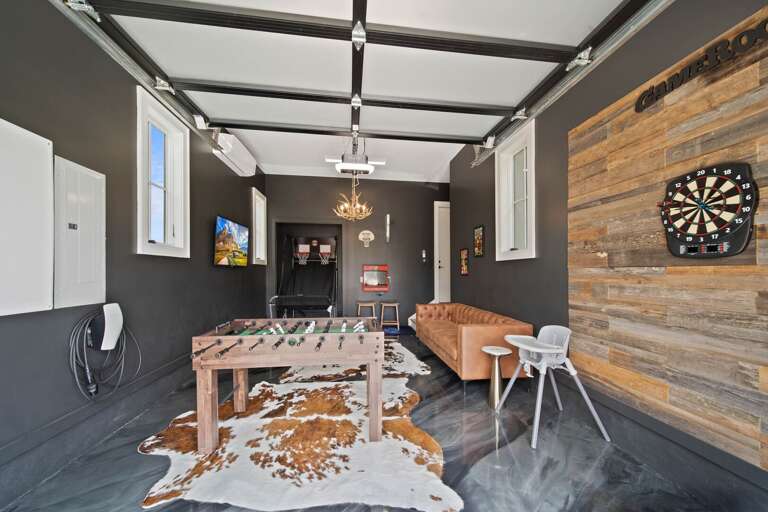 Garage Game Room with Multiple Games, TV and an EV Charger