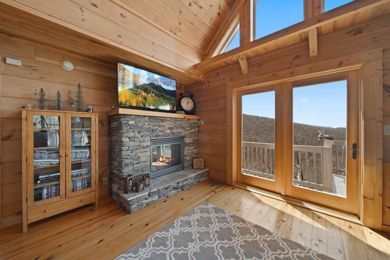 TV and Gas Fireplace in the Upper Level Main Living Room