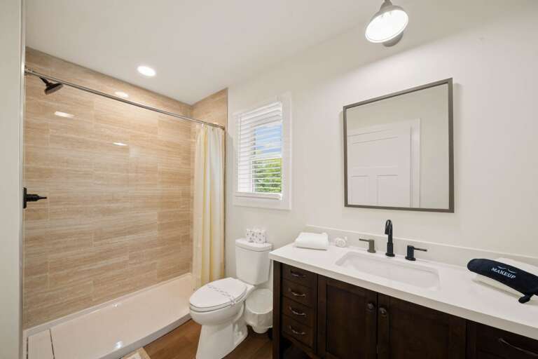 Main Floor Jack-and-Jill Bathroom with Step-In Shower