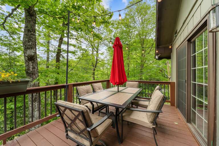 Outdoor Dining on the Deck with Accent Lighting