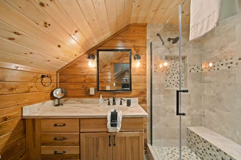 Game Room Bathroom with Tiled Shower