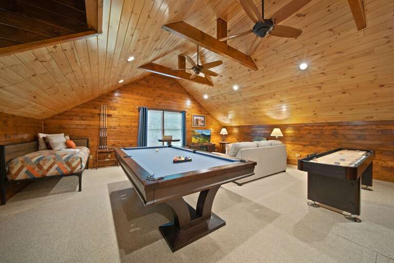 Game Room with Pool Table, Shuffleboard, TV, and Extra Sleeping Space Game Room with Pool Table, Shuffleboard, TV, and Extra Sleeping Space