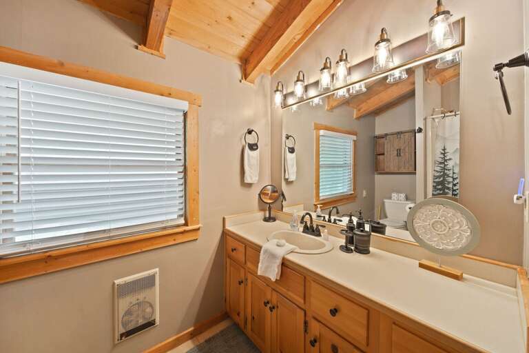 Upper Level Bathroom with Tub and Shower Combo