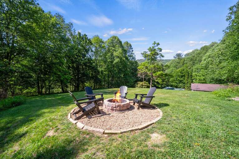 Wood Burning Fire Ring in the Spacious Yard Wood Burning Fire Ring in the Spacious Yard