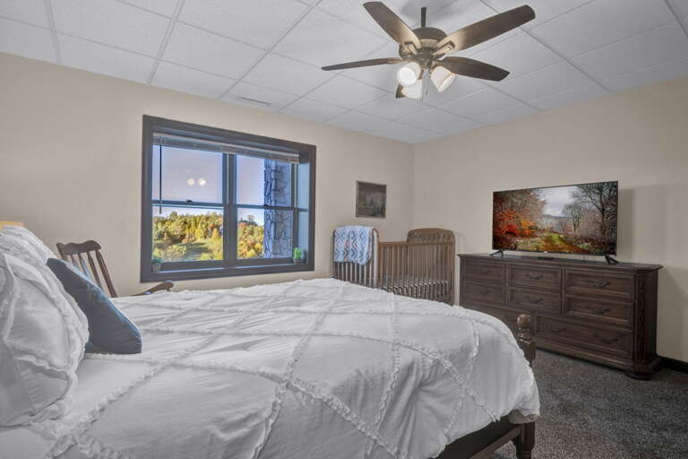 Queen Bedroom with Crib and Private Bathroom Queen Bedroom with Crib and Private Bathroom