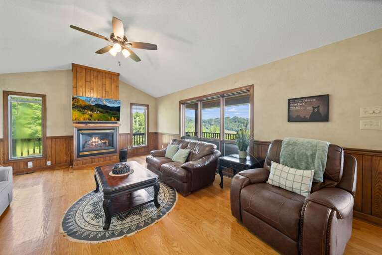 Warm Wood Floors, Leather Recliners and Gas Log Fireplace Warm Wood Floors, Leather Recliners and Gas Log Fireplace