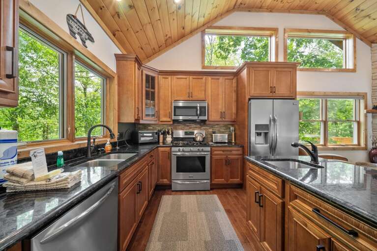 Spacious Kitchen has Granite Counters and Stainless Appliances