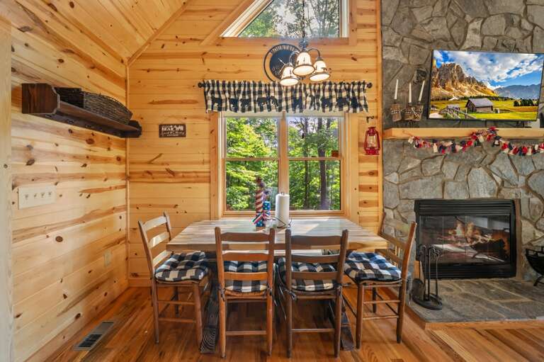 Dining Table Seats Four in Chairs, with Additional Bench Seating on the Side