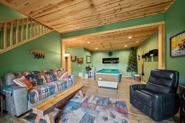 Lower Level Game Room with Comfortable Seating, TV and Pool Table