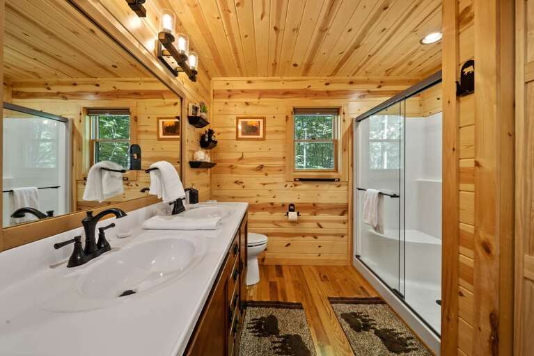 Main Floor Bathroom with Step-In Shower and Dual Sink Vanity