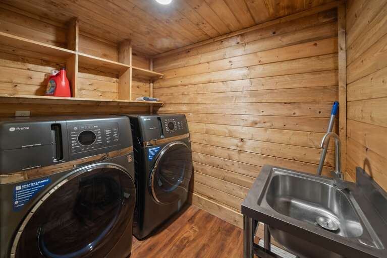 Laundry Room has Two High End Washer/Dryer Combos