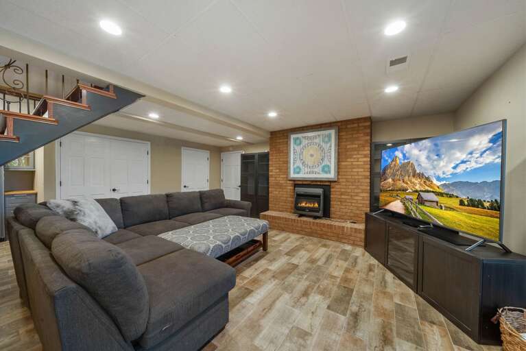 Big Screen TV and Gas Fireplace in the Family Room