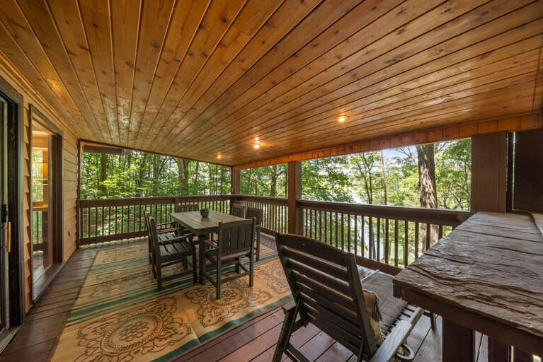 Enjoy Wooded Lake Views from the Screened in Deck