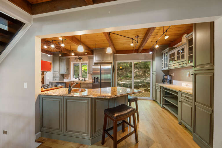Kitchen Bar with Seating and Deck Access