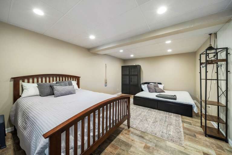 Lower Level Bedroom with Queen Bed and King Daybed