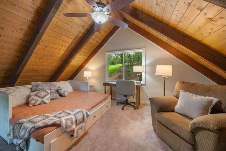 Loft Sleeping Area has a Desk, King Daybed and  Recliner