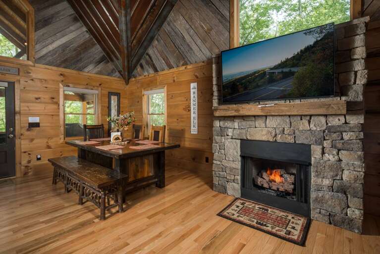 Stacked Stone Gas Log Fireplace and Big Screen TV in the Main Living Area