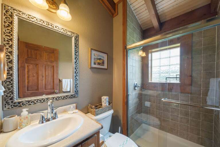 Upper Level Bathroom with Tiled Step-In Shower