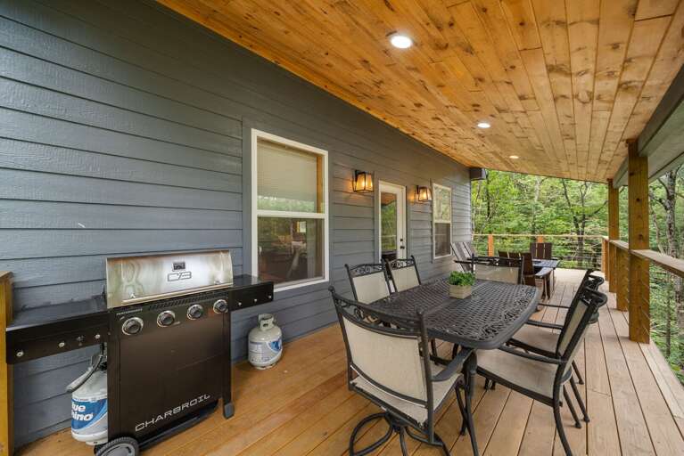 Gas Grill, Outdoor Dining and a Gas Fire Table on the Covered Deck Gas Grill, Outdoor Dining and a Gas Fire Table on the Covered Deck