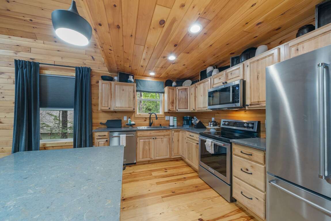 Granite Counters and Stainless Appliances in the Well Equipped Kitchen Granite Counters and Stainless Appliances in the Well Equipped Kitchen