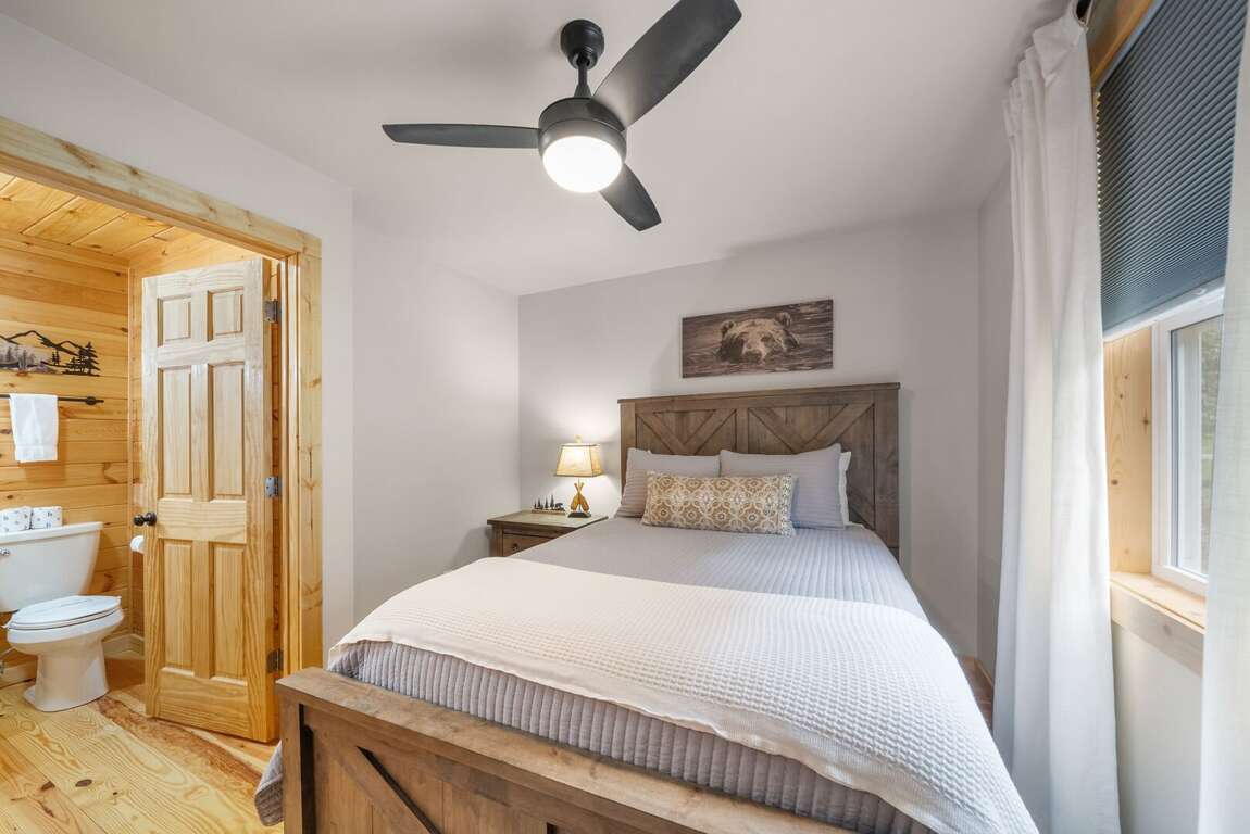 Main Floor Queen Bedroom with Jack-And-Jill Bathroom Main Floor Queen Bedroom with Jack-And-Jill Bathroom
