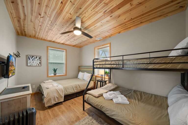 Lower Level Bunk Room with a Queen Bed and Twin-Over-Queen Bunk