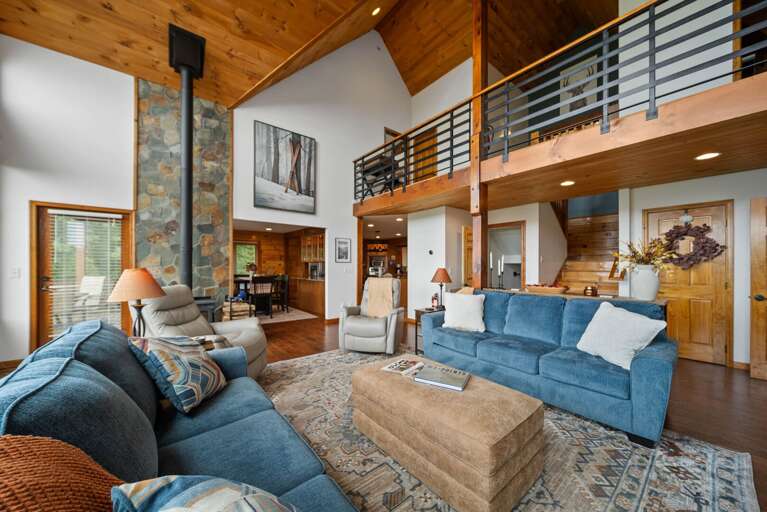 Soaring Wood Ceilings, Warm Wood Floors and Cozy Seating