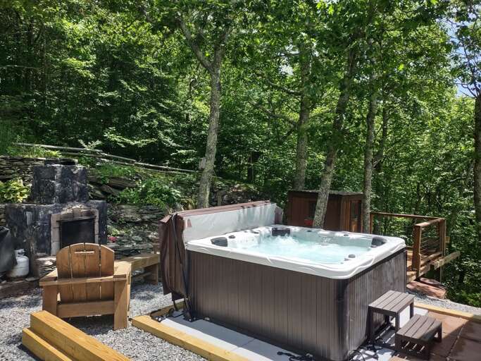 Hot Tub Adjacent to the Fireplace, Grill and Kids Play Area