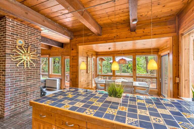 Brick, Wood and Tile Combine for a Rustic Mountain Retreat