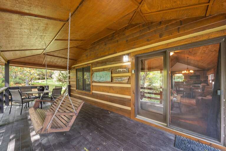 Enjoy the Peaceful Setting on the Porch Swing