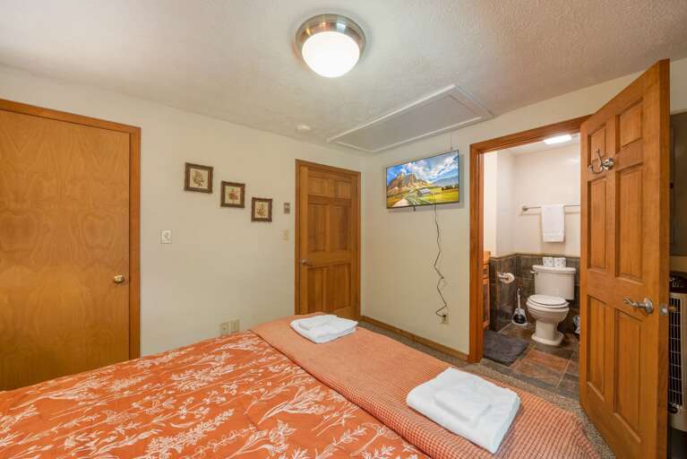 TV and Private Bathroom in the Queen Bedroom