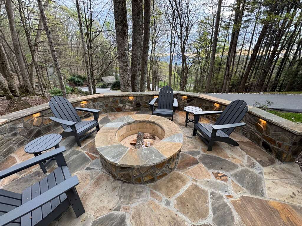 Enjoy Evenings Around the Custom Fire Pit with Lighting and Seating Enjoy Evenings Around the Custom Fire Pit with Lighting and Seating