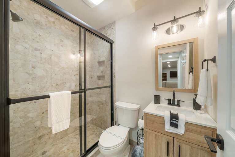 Shared Lower-Level Hallway Bathroom Shared Lower-Level Hallway Bathroom