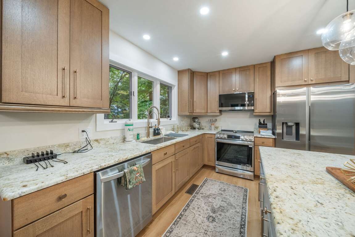 Stainless Appliances, Granite Counters and Phone Charging Station Stainless Appliances, Granite Counters and Phone Charging Station