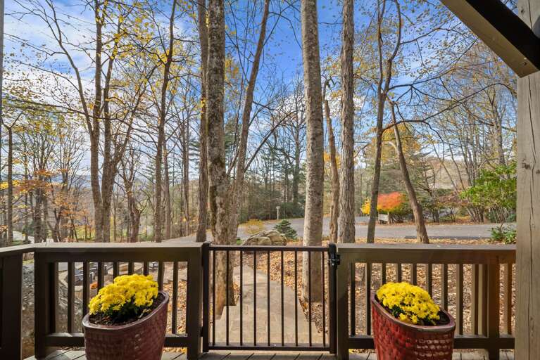 Enclosed Deck Leads to Fire Pit Pathway