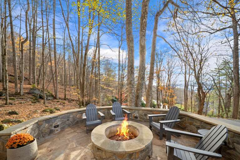 Enjoy Evenings Around the Custom Fire Pit with Lighting and Seating