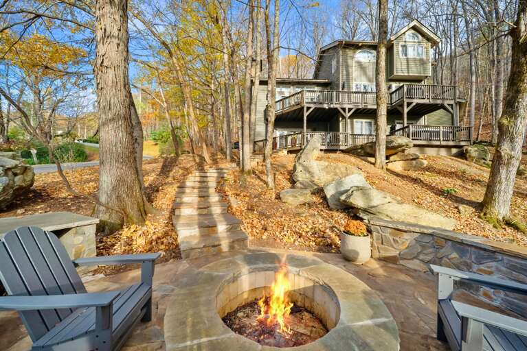 Flagstone Custom Fire Pit and Boulder Lined Pathway