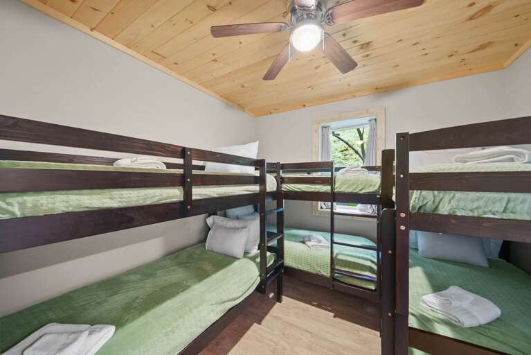 Bottom Level Bunk Room with Three Twin-Over-Twin Bunks