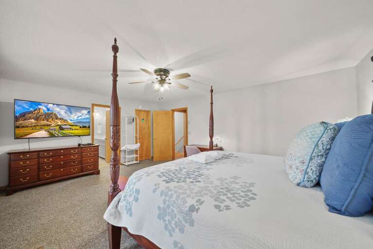 Desk, TV and Ensuite Bathroom in the King Bedroom