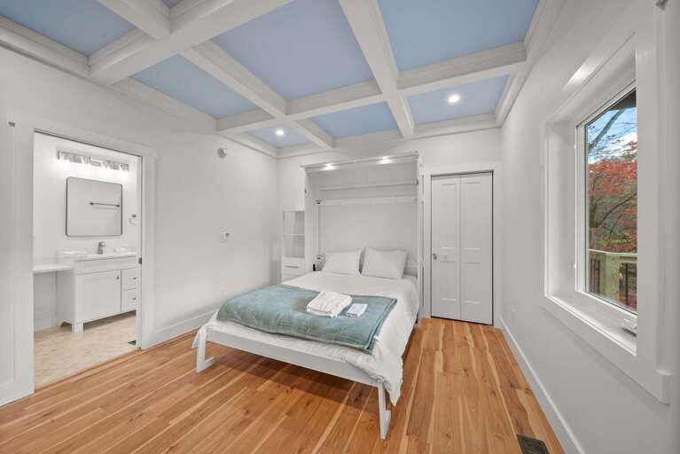 Queen Bed and Full Bathroom in the Lower Level