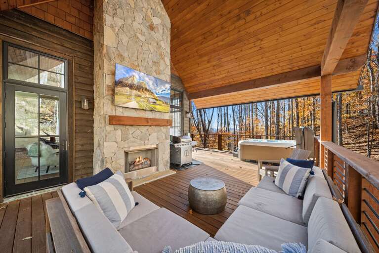 Outdoor Covered Living Space with Gas Fireplace and TV