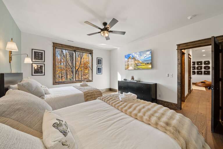 Two Queen Beds with a TV