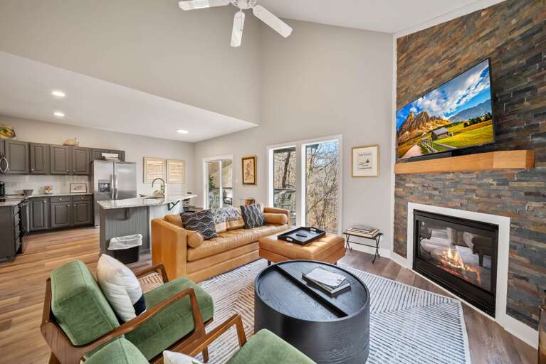 Gas Fireplace, TV and Leather Sofa in the Living Room