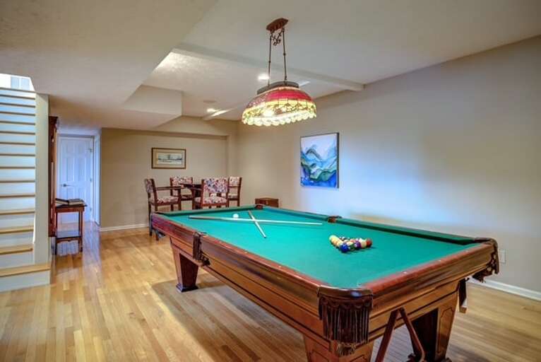 Lower Level Game Room with Pool Table and Card Table